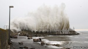 Waves overtopping the harbour wall at Portmahomack during December 2012 storm.